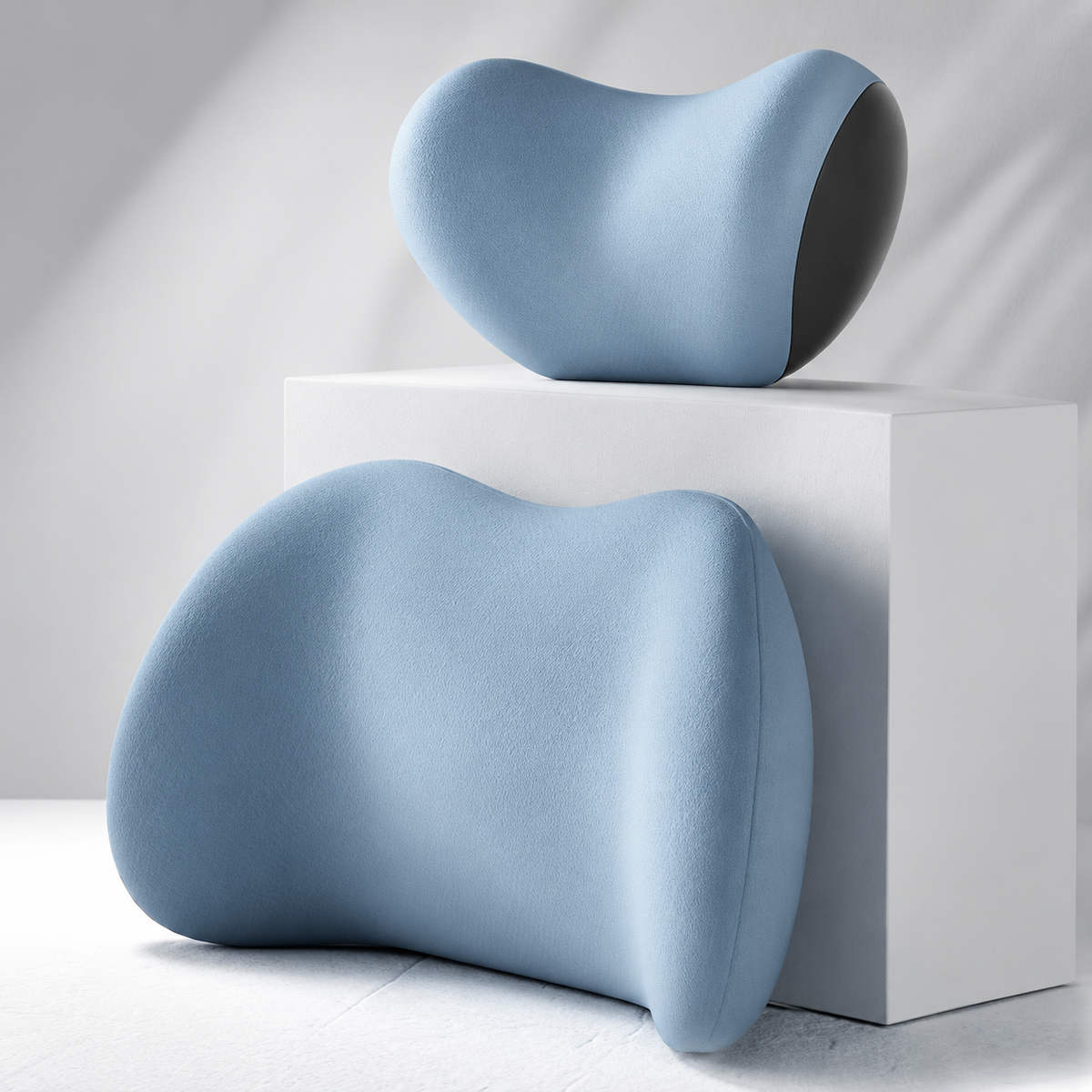 Light blue ergonomic lumbar cushion and matching neck support pillow